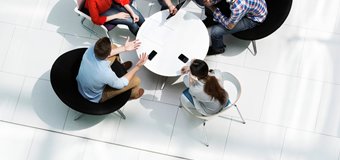 Overhead view of colleagues in a meeting